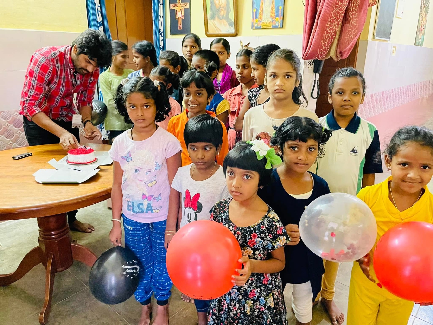 TVSR Foundation activity with children holding balloons
